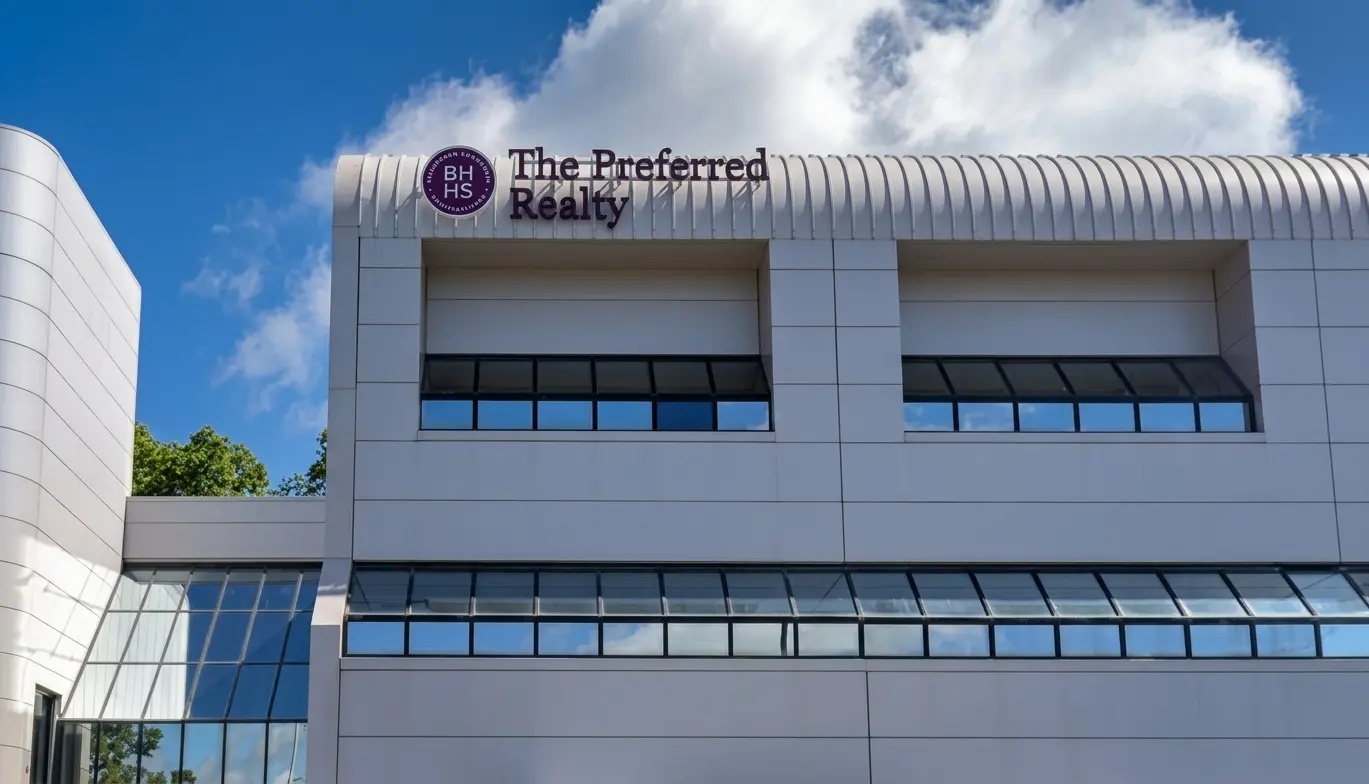 Dimensional rooftop sign for The Preferred Realty with BHHS circular logo mounted on a modern commercial office building facade, fabricated by Spark Signs in Moon Township PA