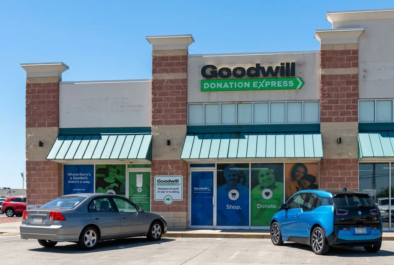 Channel letter sign and window graphics on a Goodwill Donation Express retail storefront, fabricated and installed by Spark Signs in Wexford PA