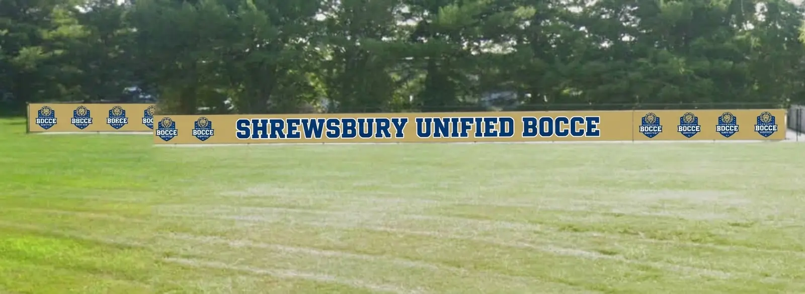 Large outdoor fence banner wrap for Shrewsbury Unified Bocce on an athletic field perimeter, produced by Spark Signs in Wexford PA